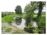 Canal at Garthmyl Copyright John Firth and licensed for reuse  under this Creative Commons Licence