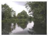 Offices & shops back onto the river as you near the town centre