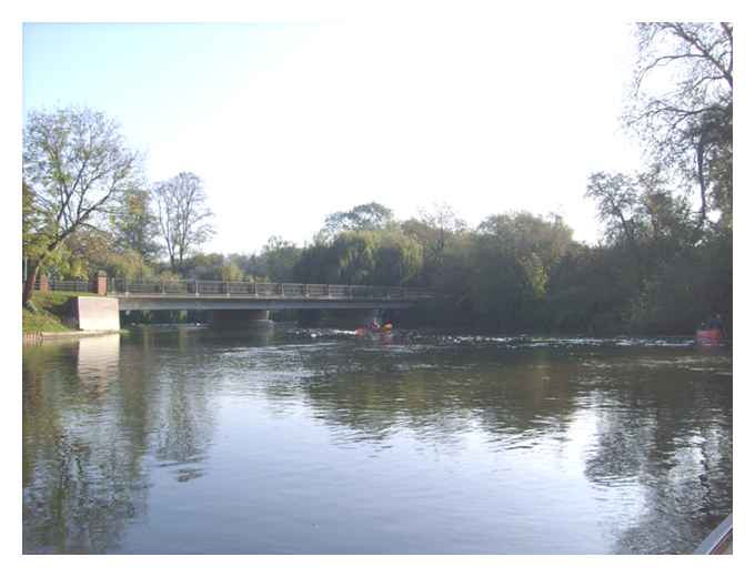 Launch into the weir streanm at Sonning Eye 